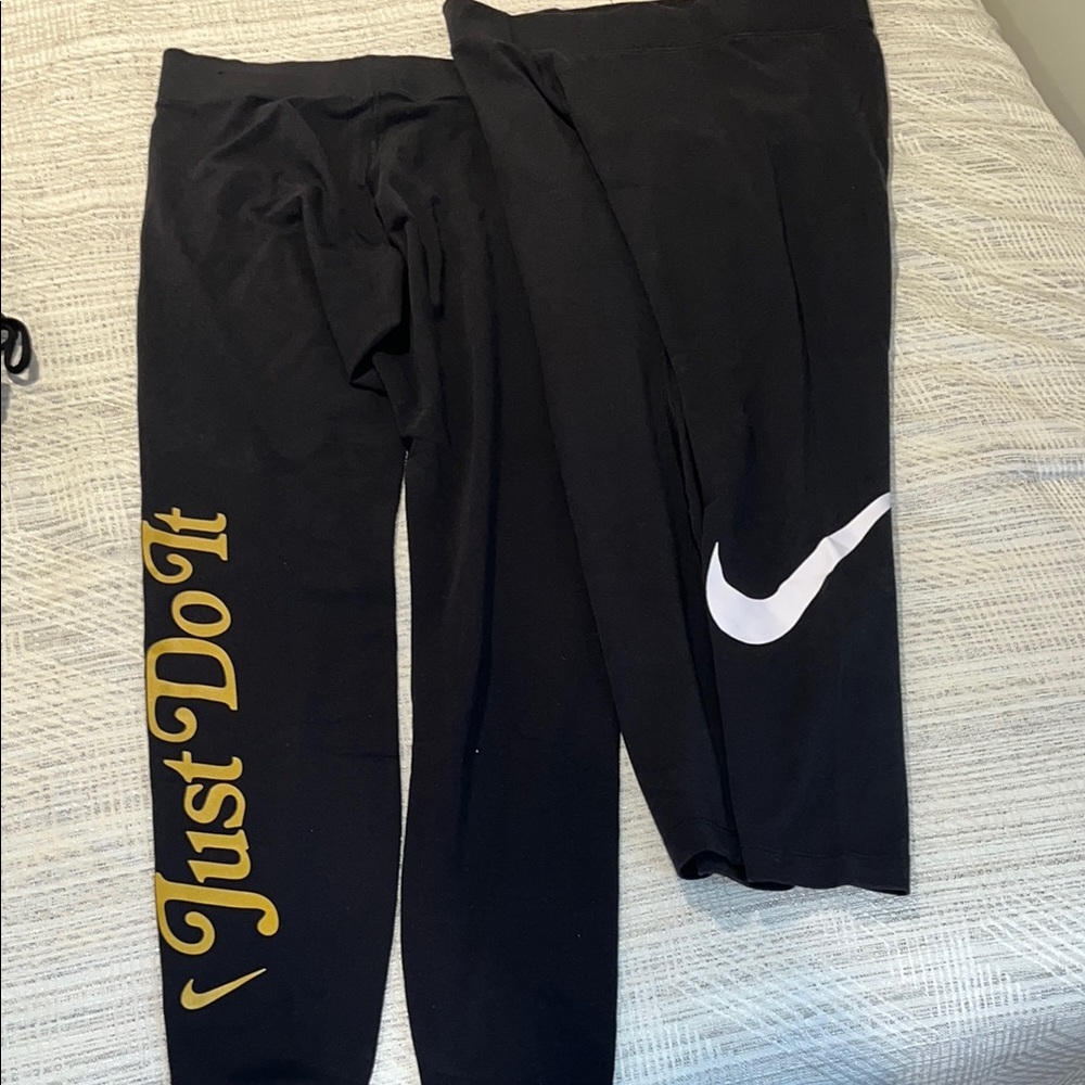 Nike Black and Gold Leggings with Iconic Swoosh